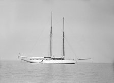 The schooner 'Joyance' at anchor, 1913. Creator: Kirk & Sons of Cowes.