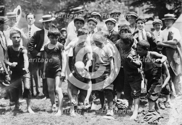 Hot day in N.Y., after a swim in fountain., between c1910 and c1915. Creator: Bain News Service.