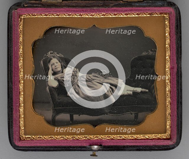 Untitled (portrait of a girl reclining on a chaise longue), 1855.  Creator: John Adams Whipple.