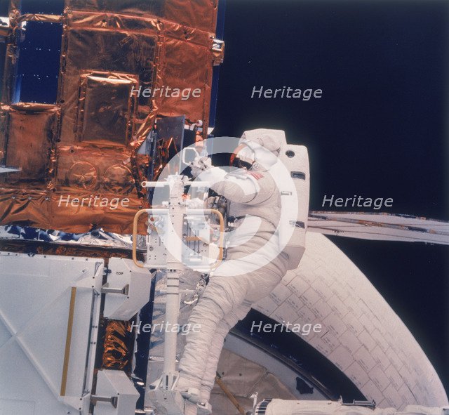 Astronaut on Shuttle mission 41-C, 1984. Artist: Unknown