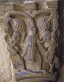 Capital decorated with the Good Shepherd with two figures on each side carrying a lamb and wolves…