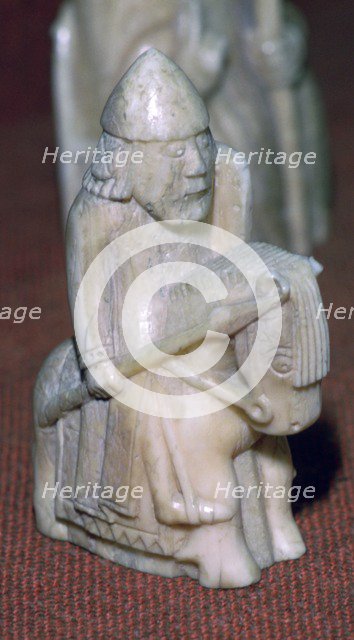 A Knight - The Lewis Chessmen, (Norwegian?), c1150-c1200. Artist: Unknown