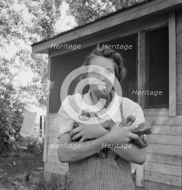 Possibly: Mrs. Schrock takes good care of her family, Yakima Valley, Washington (near Wapato), 1939. Creator: Dorothea Lange.