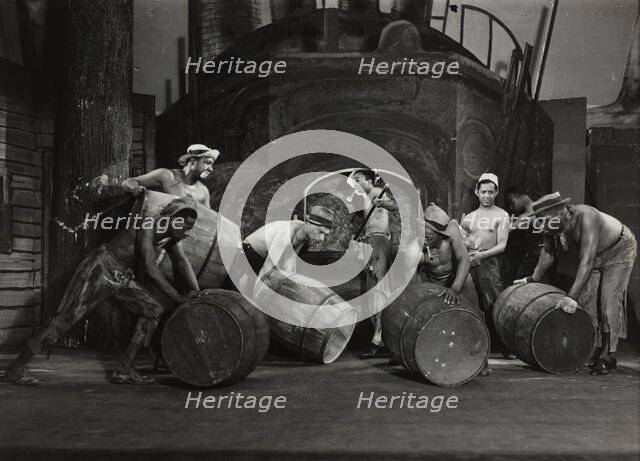 Men moving barrels, 1936. Creator: Milton Meltzer.