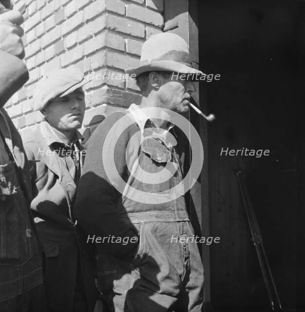Warehouse used as distributing office for FSA relief grants, Bakersfield, CA, 1938. Creator: Dorothea Lange.