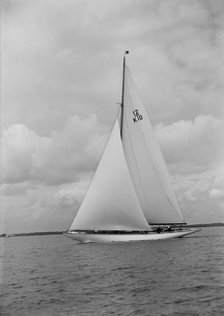 'Trivia', a 12 Metre class yacht sails close-hauled, 1939. Creator: Kirk & Sons of Cowes.