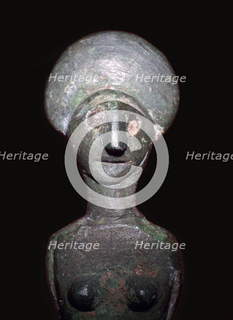 Detail of a Celtic-Iberian style bronze female figurine. Artist: Unknown