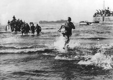 Troops of the American 5th Army landing on the Italian coast south of Rome, 1944. Artist: Unknown