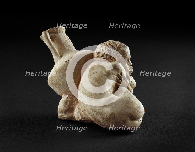 Terracotta figurine of an Afro-Hellenic boy, possibly a slave with Rhodian amphora, 4th century BC. Artist: Unknown.