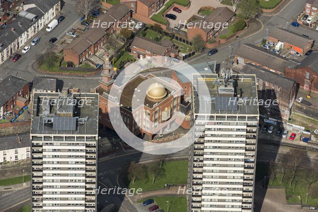 Golden Mosque overshadowed by two of the Seven Sisters towers, Rochdale, 2019. Creator: Historic England.
