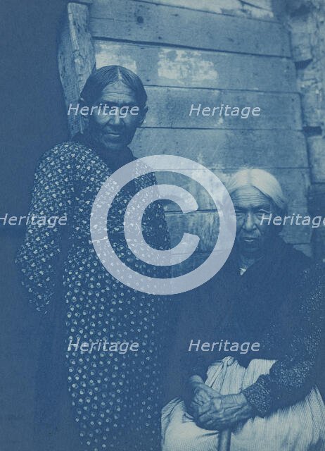 Two Native American women, posed, on Mackinac Island, 1903. Creator: Frances Benjamin Johnston.