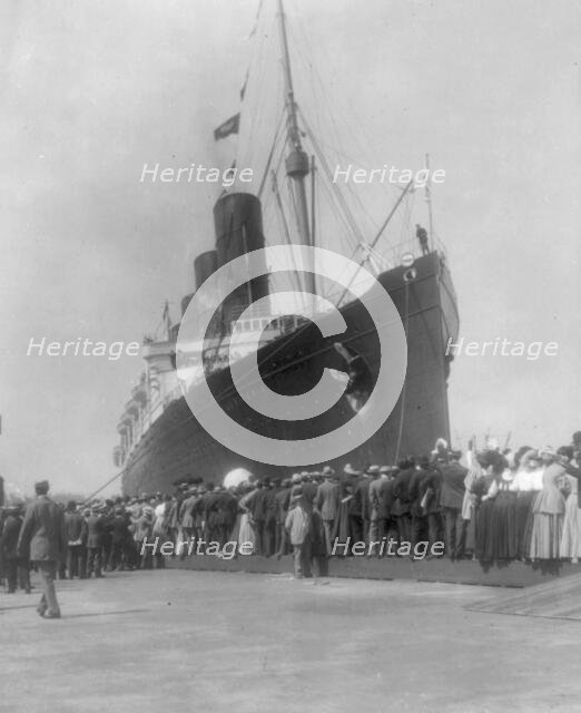 LUSITANIA arriving in N.Y. for first time, Sept. 13, 1907: bow & portside view at dock..., 1907. Creator: Frances Benjamin Johnston.