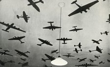 Silhouettes of military aircraft...at an RAF training school during the Second World War, 1941. Creator: Charles Brown.