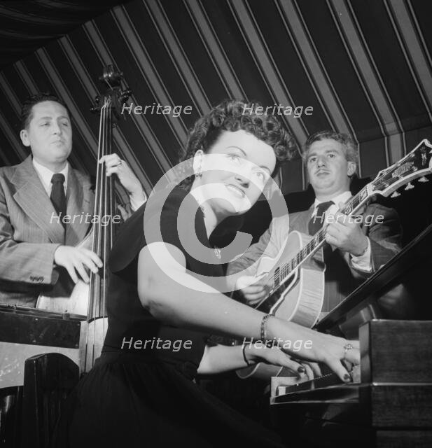 Portrait of Dardanelle and Joe Sinacore, Hickory House, New York, N.Y., ca. July 1947. Creator: William Paul Gottlieb.
