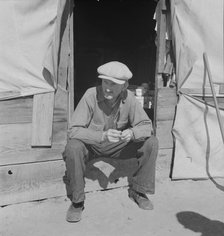Tubercular migrant in a potato pickers' camp, Kern County, California, 1937. Creator: Dorothea Lange.