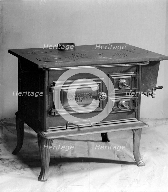 Wood burning stove, manufactured by Landskrona Foundry, Sweden, 1900. Artist: Unknown