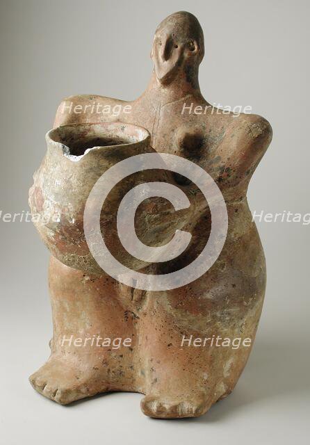 Female Figurine Holding Jar. Creator: Unknown.
