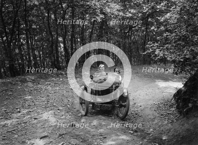 Anzani GN Special of Barbara Marshall, B&HMC Brighton-Beer Trial, Fingle Bridge Hill, Devon, 1934. Artist: Bill Brunell.