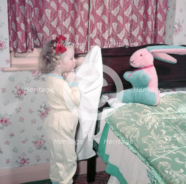 Bedtime for a little girl, c1955. Creator: Arthur Charles Kirby Ware.