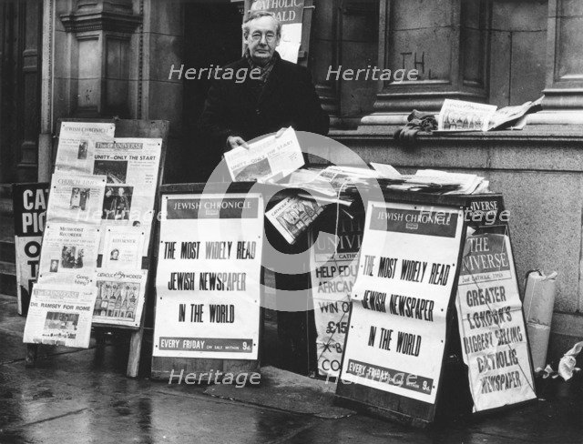 The Jewish Chronicle on sale outside Westminster Cathedral, London, 1966. Artist: EH Emanuel