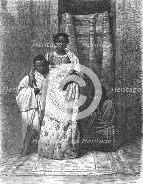 'A Madegasse women and her Children; A Birds-eye View of Madagascar', 1875. Creator: M.D Charnay.