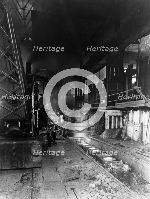Teeming (pouring) molten steel, Park Gate Iron & Steel Co, Rotherham, South Yorkshire, April 1955. Artist: Michael Walters