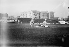Guy Zinn, New York AL, sliding back into first base against Boston at Hilltop Park..., 1912. Creator: Bain News Service.
