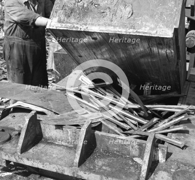 Deutsch Paters box baler crushing scrap, Rotherham, South Yorkshire, 1963.  Artist: Michael Walters