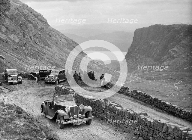 SS Jaguar 1 competing in the RSAC Scottish Rally, 1936. Artist: Bill Brunell.