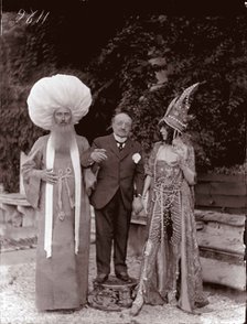 The Marchesa Casati by Giovanni Boldini and a man in a mask, 1913.