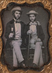 Two Seated Young Men Holding Ivory-topped Walking Sticks, 1850s. Creator: Unknown.