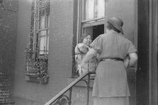 A tenant, 61st Street between 1st and 3rd Avenues, New York, 1938. Creator: Walker Evans.