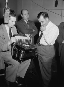 Portrait of Joe Mooney, Milt Gabler, and Morty Palitz, Decca studio, New York, N.Y., ca. Dec. 1946. Creator: William Paul Gottlieb.