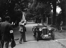 MG TA of RA MacDermid, winner of a bronze award at the MCC Torquay Rally, July 1937. Artist: Bill Brunell.