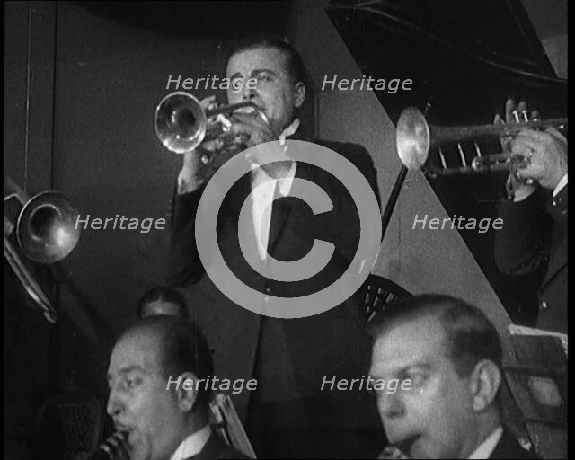 People Dancing to the Sounds of a Jazz Band in a Night Club, 1929. Creator: British Pathe Ltd.