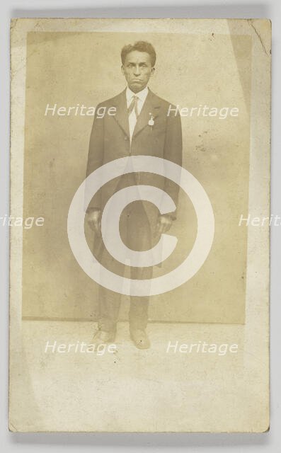 Photographic postcard of a man in a suit, 1904-1918. Creator: Unknown.
