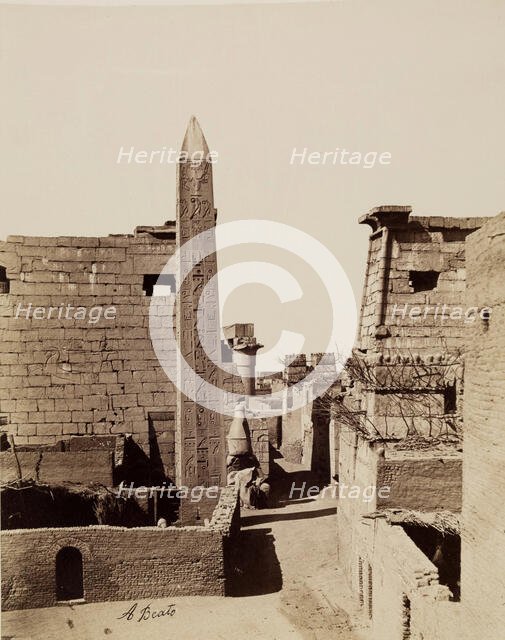 Entrance to Temple of Luxor with Modern Mud-Brick Houses. Luxor, East Bank, between 1860 and 1903. Creator: Antonio Beato.