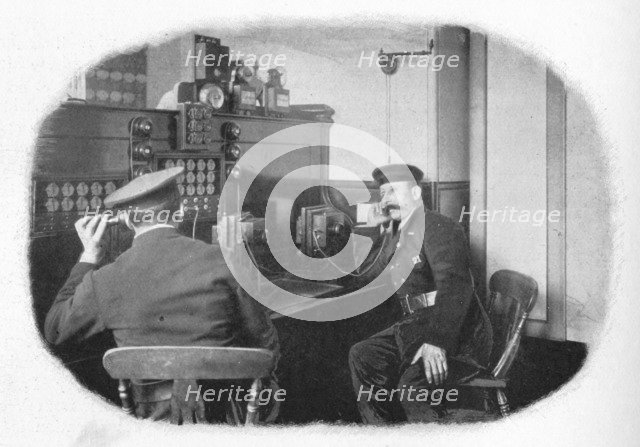 At the telephone, London Fire Brigade, c1900 (1901). Artist: Unknown.