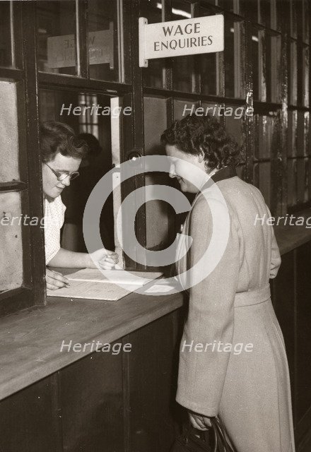 Wages office, Rowntree factory, York, Yorkshire, 1952. Artist: Unknown