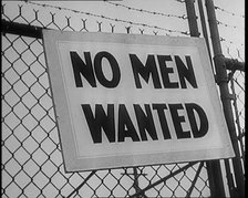 A Sign Hanging on a Fence. Sign Read: 'No Men Wanted', 1929. Creator: British Pathe Ltd.