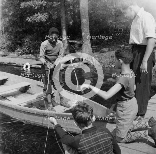 Fishing at Camp Nathan Hale, Southfields, New York, 1943. Creator: Gordon Parks.