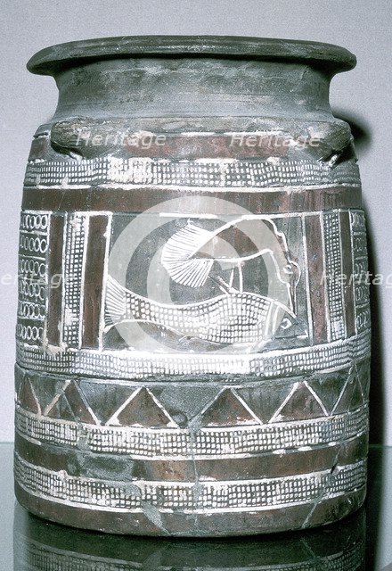 Terracotta pot with motif of bird eating a fish, Susa, c2000-c1940 BC. Artist: Unknown