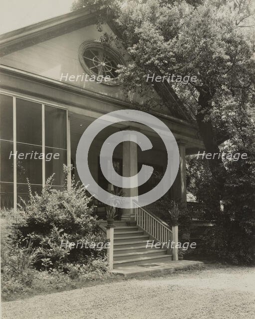 Cottage garden, Natchez, Adams County, Mississippi, 1938. Creator: Frances Benjamin Johnston.