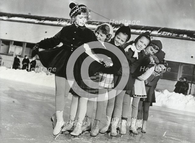 Princess Christina of Sweden, the ice princess, with friends, 1953. Artist: Unknown