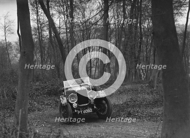 Alvis 12/50 at the Standard Car Owners Club Southern Counties Trial, Hale Wood, Chilterns, 1938. Artist: Bill Brunell.