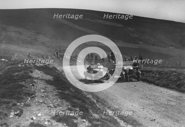 Lagonda of WH Oates and DFP of JC Douglas competing in the Scottish Light Car Trial, 1922. Artist: Bill Brunell.
