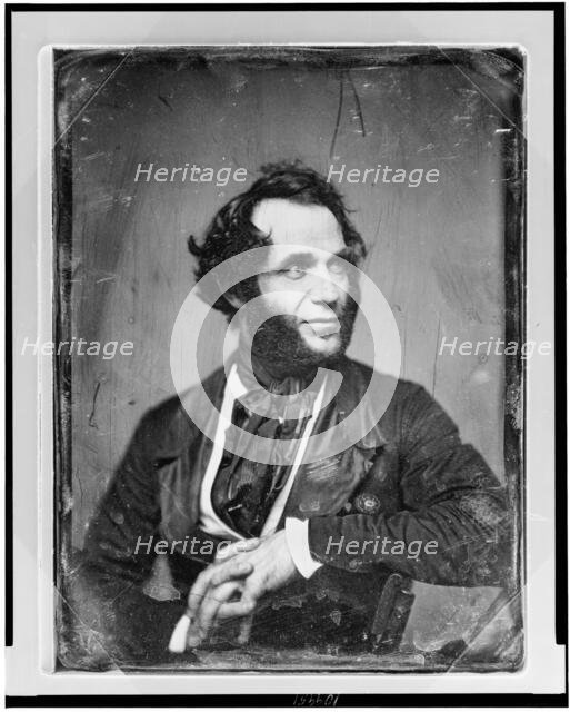 Unidentified man, about 40 years of age, half-length portrait, slightly..., between 1844 and 1860. Creator: Mathew Brady.