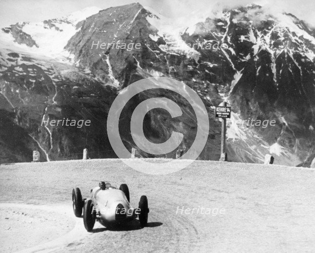 Hermann Muller in an Auto Union, German Mountain Grand Prix, Grossglockner, Austria, 1939. Artist: Unknown