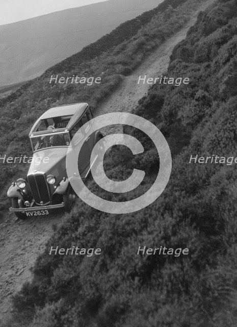 Kitty Brunell road testing a Standard Little Twelve saloon, c1932. Artist: Bill Brunell.