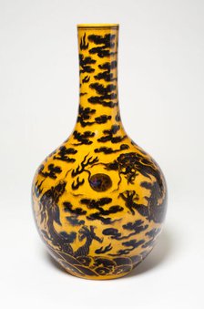 Yellow and Brown-Enameled 'Dragon' Bottle Vase, Qing dynasty, Kangxi period (1662-1722). Creator: Unknown.